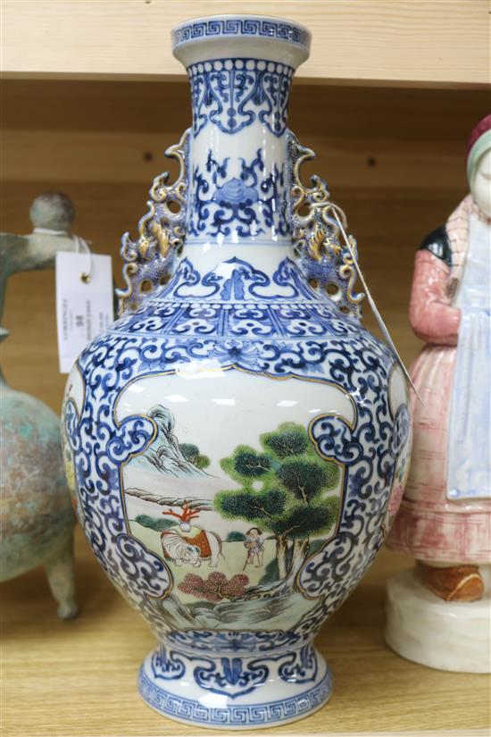 A Chinese famille rose and blue and white vase